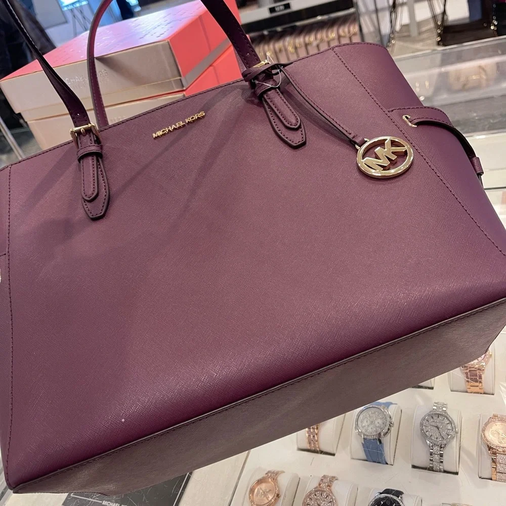 Michael Kors Gilly Large Drawstring Travel Leather Top Zip Tote 
Oxblood Color - Picture 14 of 16